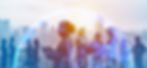 Silhouetted business people converse, shake hands against a cityscape backdrop with a digital globe overlay, creating a global theme.