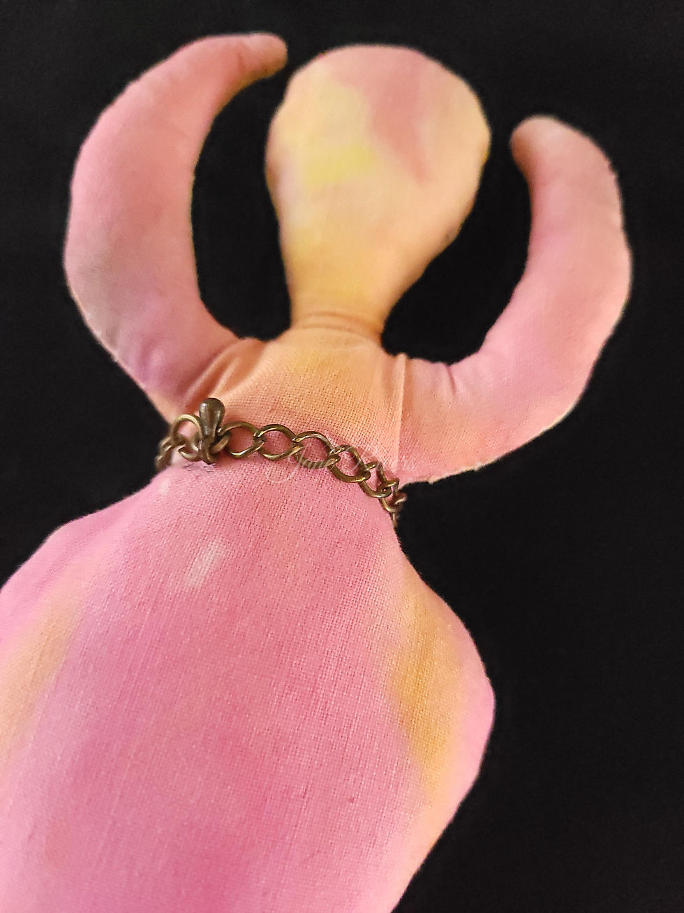 Thumbnail: Godess doll back view of bead detail
