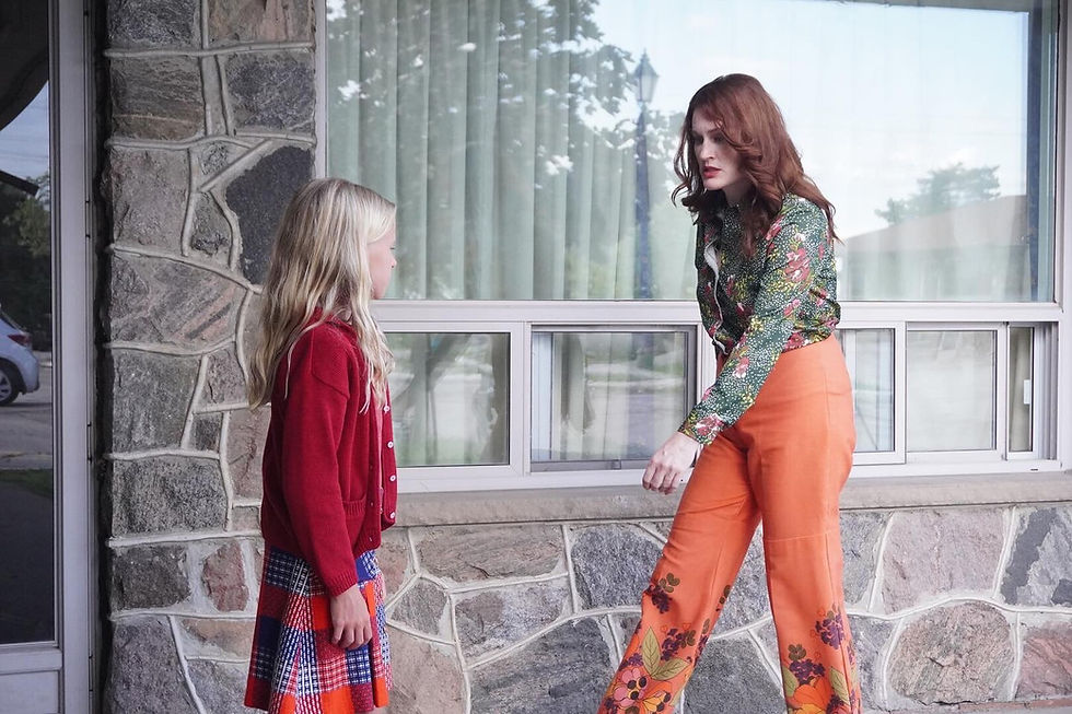 The Curtain - Delaney Tomchick and Beth Hornby