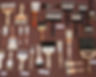 Brown paper background with old paint brushes displayed