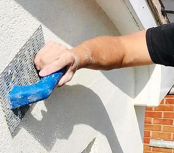 Applying-external-wall-coating.jpg