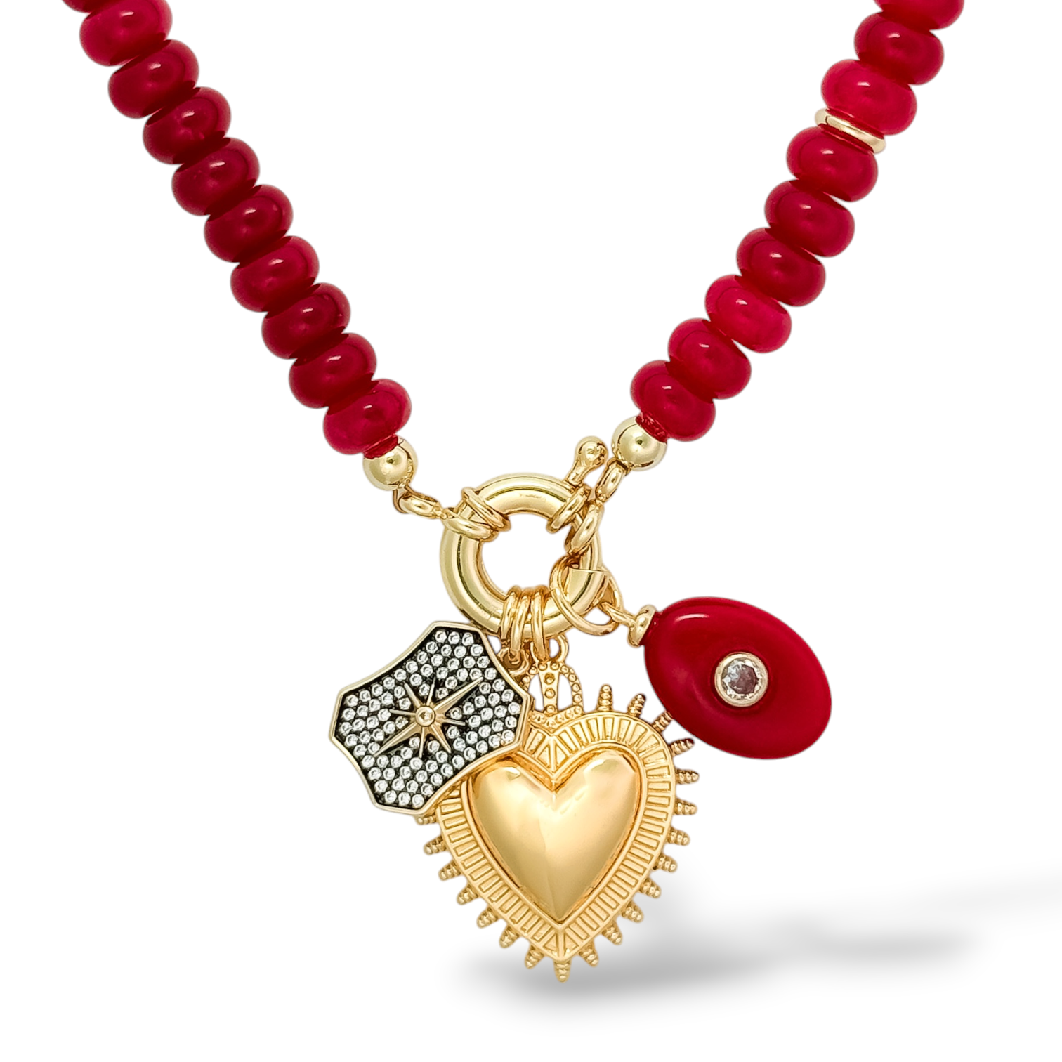 Heritage Heart Necklace with the Sacred Heart Charm, Starlight Crest Charm in Midnight Black, and Vermilion Jewel Charm.