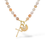 Thumbnail: Charm view Peachy Keen Airy Necklace with gold-filled sunburst charm and cross charm on peach beads