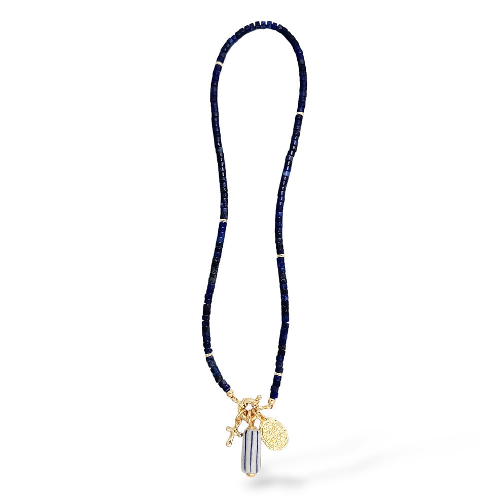 Full-length Teeny Carlisle Necklace featuring natural navy stone beads and signature gold charms.