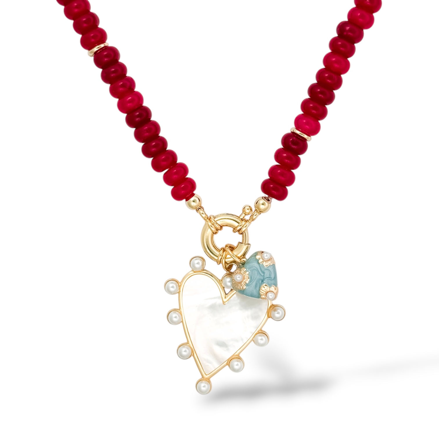 Pearl & Petal Necklace with the Celine Heart Charm and Fleur Heart Charm in Sky Blue.