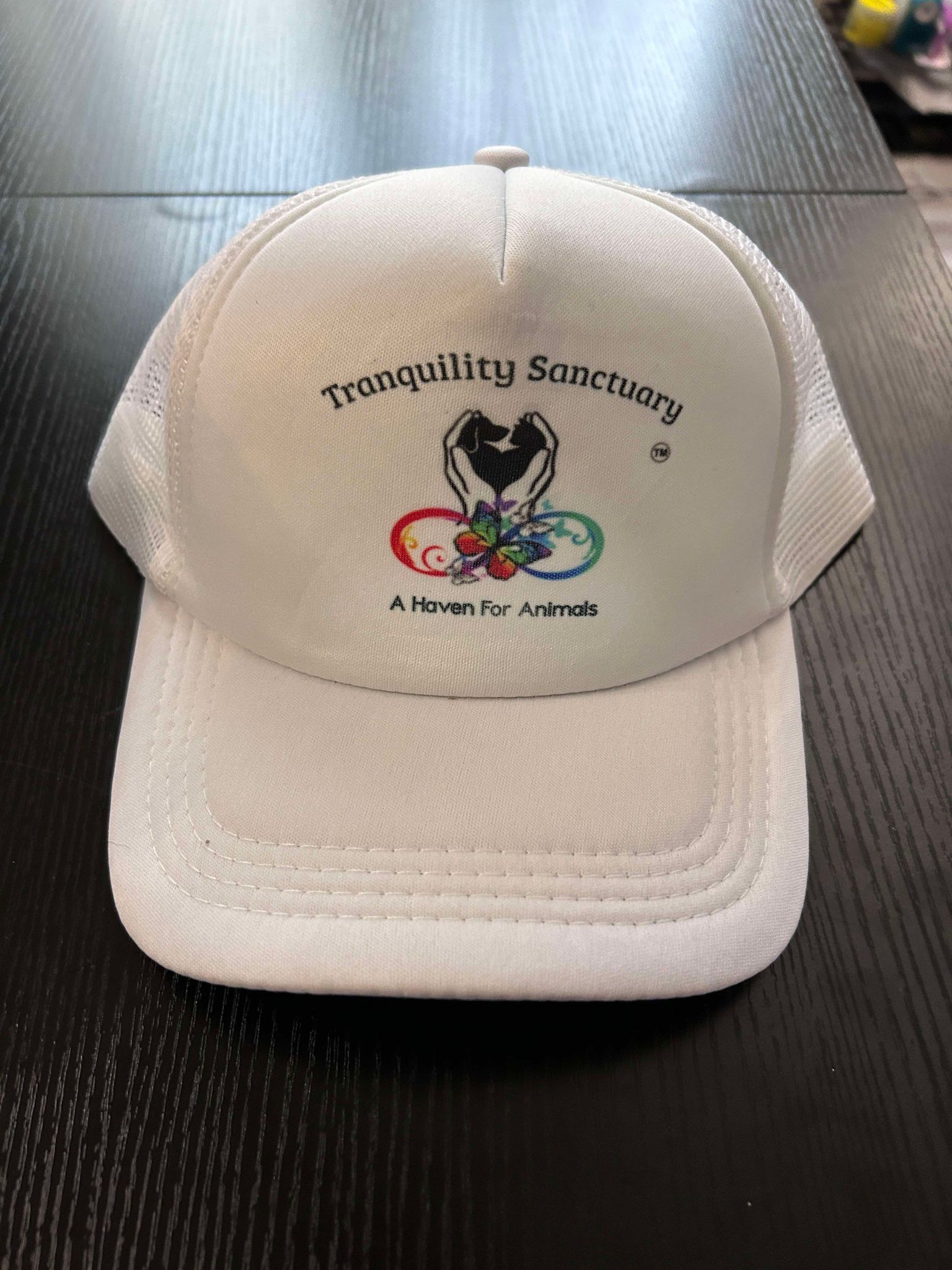 Tranquility Sanctuary Cap - A Haven for Animals
