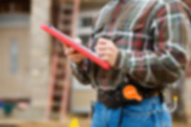 Man with clipboard.jpeg