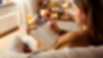 Woman sketching a pumpkin in a cosy room, surrounded by candles and autumn decor. Warm colors create a relaxed, creative atmosphere.