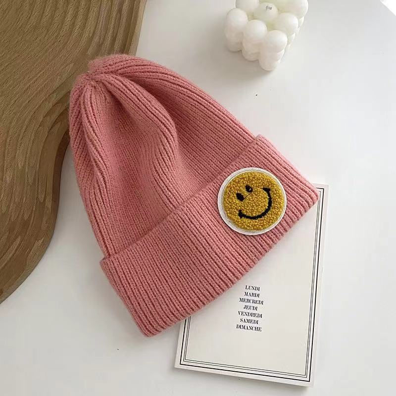 Thumbnail: Smiley Face Sweater Knit Beanie Hat