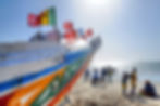 Boats-onSanyang-Beach-Gambia-scaled.jpg