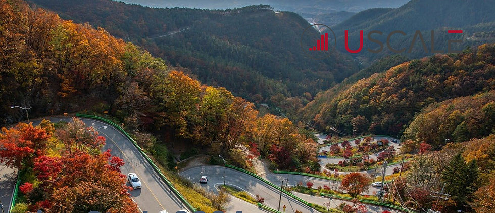 Mountain road in serpentines in autumn