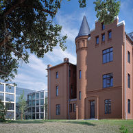 rote Steinvilla mit Türmchen