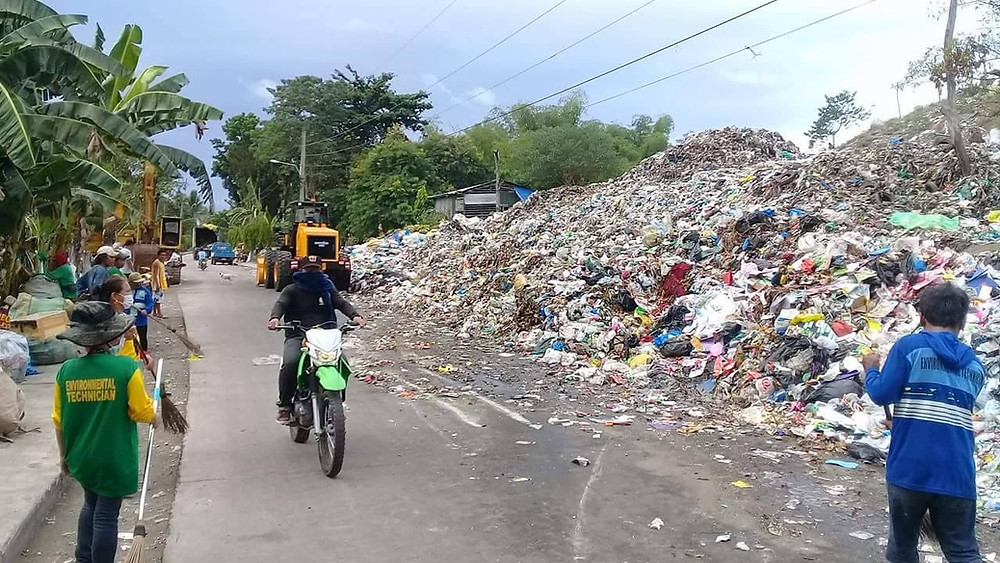 Dumpsite in Dumaguete City, Negros Oriental that almost covers the entire road in Barangay Candau-ay