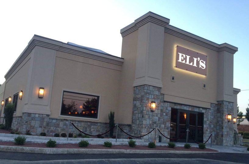 High-end stucco stone installation on a property in Madison, CT, showcasing Quality Stucco's expertise.