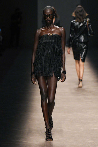 A mesmerizing display on Tom Ford's runway: Samatex's leather fringe dress stole the show with its impeccable craftsmanship and breathtaking look