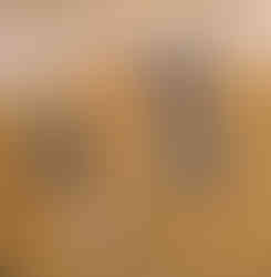 Painting of 3 baby turtles crawling across the sand to enter the water