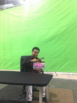 Holding a slate board on the set of Homeland