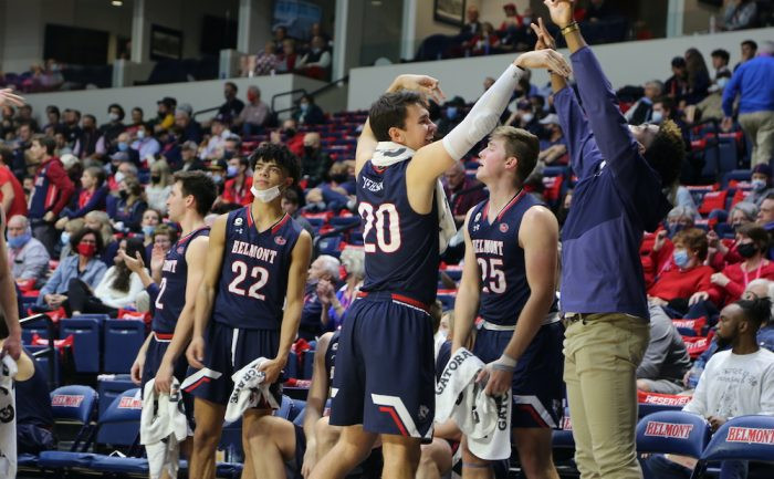 Tate Pierson celebrates from the bench with his teammates during Belmont's 94-65 win over Lipscomb.