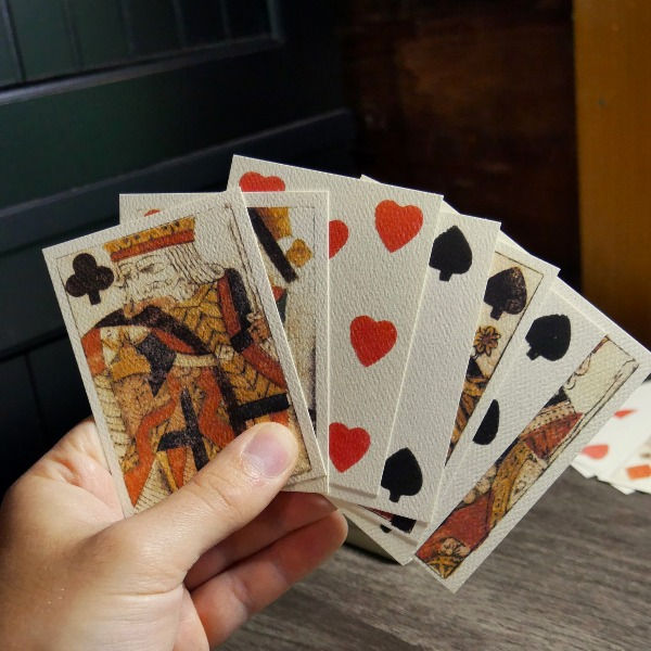 Playing Cards in Hand