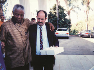 Nelson Mandela with his jailer Christo Brand, who grew to become his friend. Photo provided by The Leonard Lopate Show, WNYC.