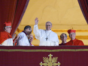 Pope Francis waving on the balcony of St. Peter’s Basilica after being elected
