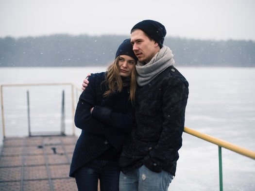 Couple standing outside