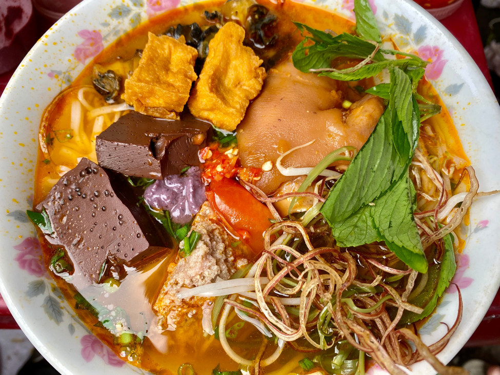 Bun rieu Vietnamese crab soup preparation Hom Market Hanoi authentic