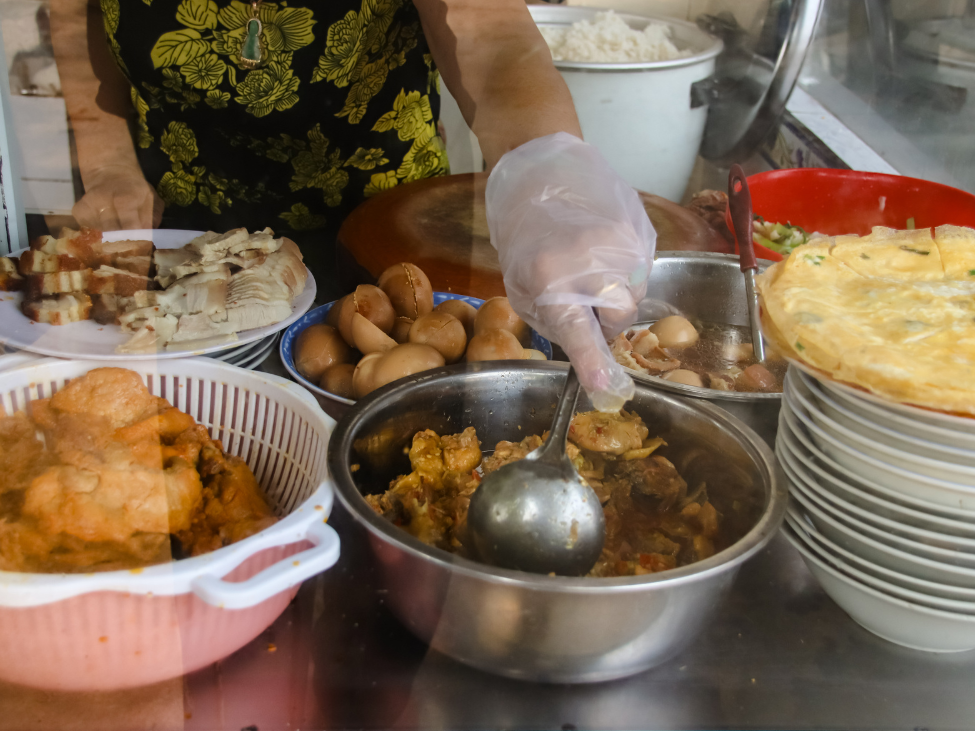 Vietnamese dong currency street food market payment Hanoi local vendor