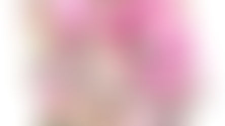 Watercolor of a blossoming branch with vibrant pink plum (ume) flowers in early bloom, set against a softly blurred background of more blossoms. The delicate petals contrast with the rough, grayish-brown bark of the twisting branches, capturing the quiet beauty of spring’s arrival