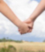 two-people-holdings-hands-together-friendship-love-concepts-2.jpg