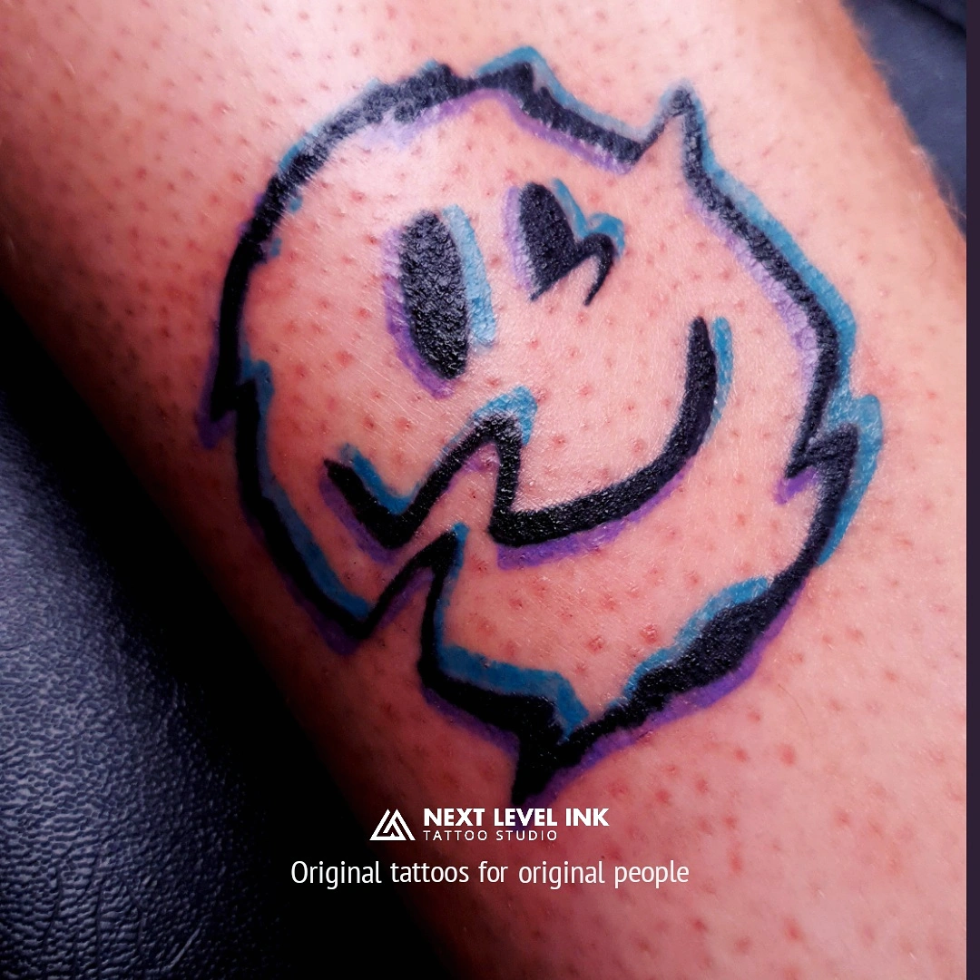 small tattoo, fine line tattoo, smiley tattoo