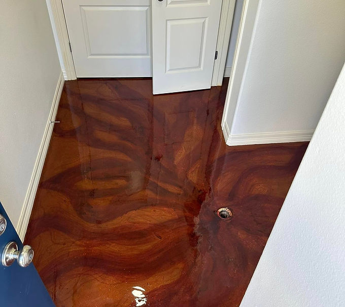 close-up of stained concrete surface with natural color variation