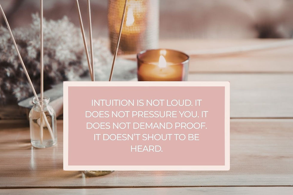 an aesthetic set up with incense and candles on a wooden table and flowers in the background