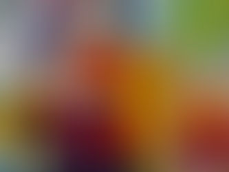 Pints of beers next to a pumpkin