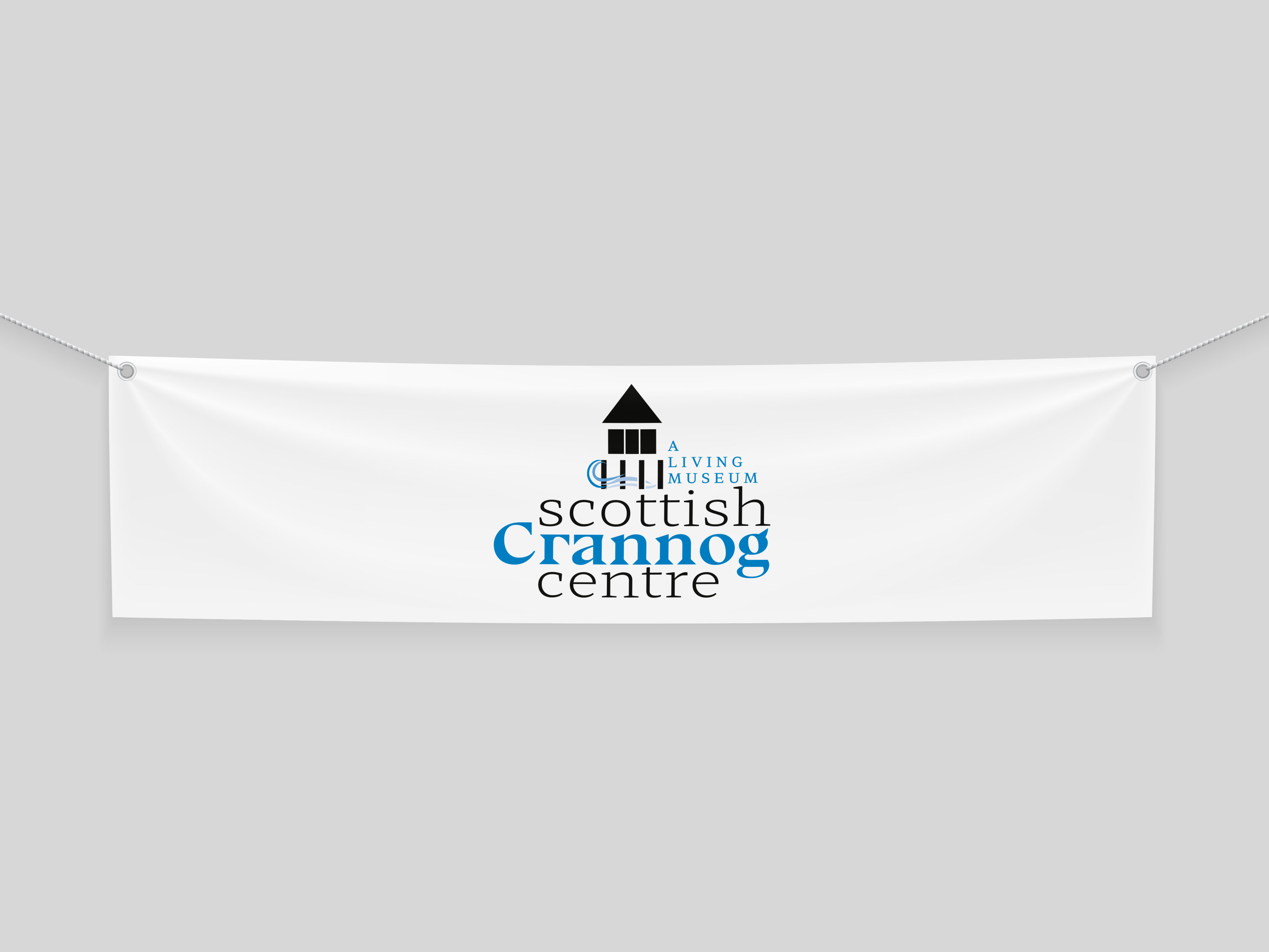 scottish crannog centre graphic on a white banner 