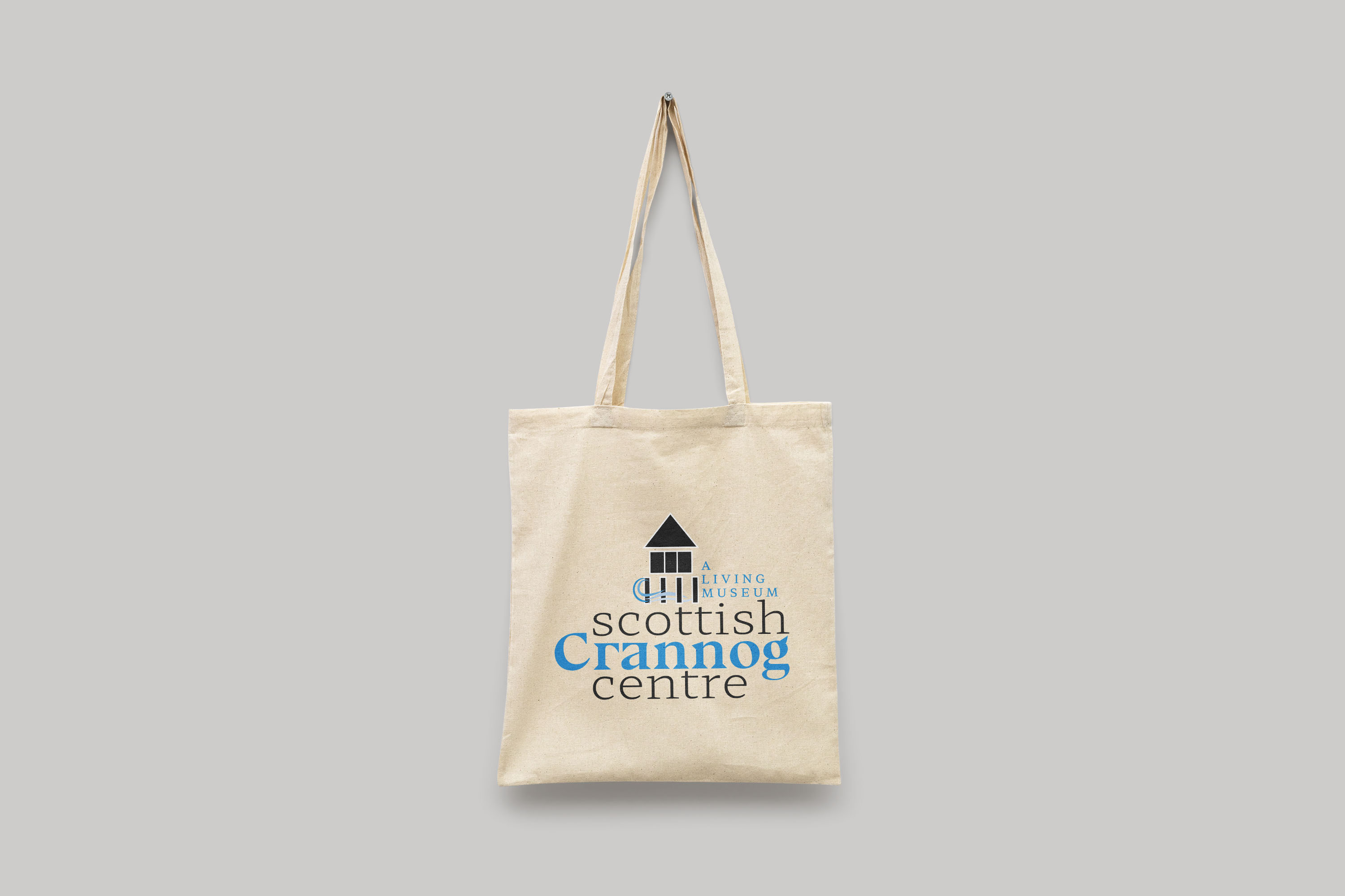 eco-friendly tote bag show crannog design in blue and white 