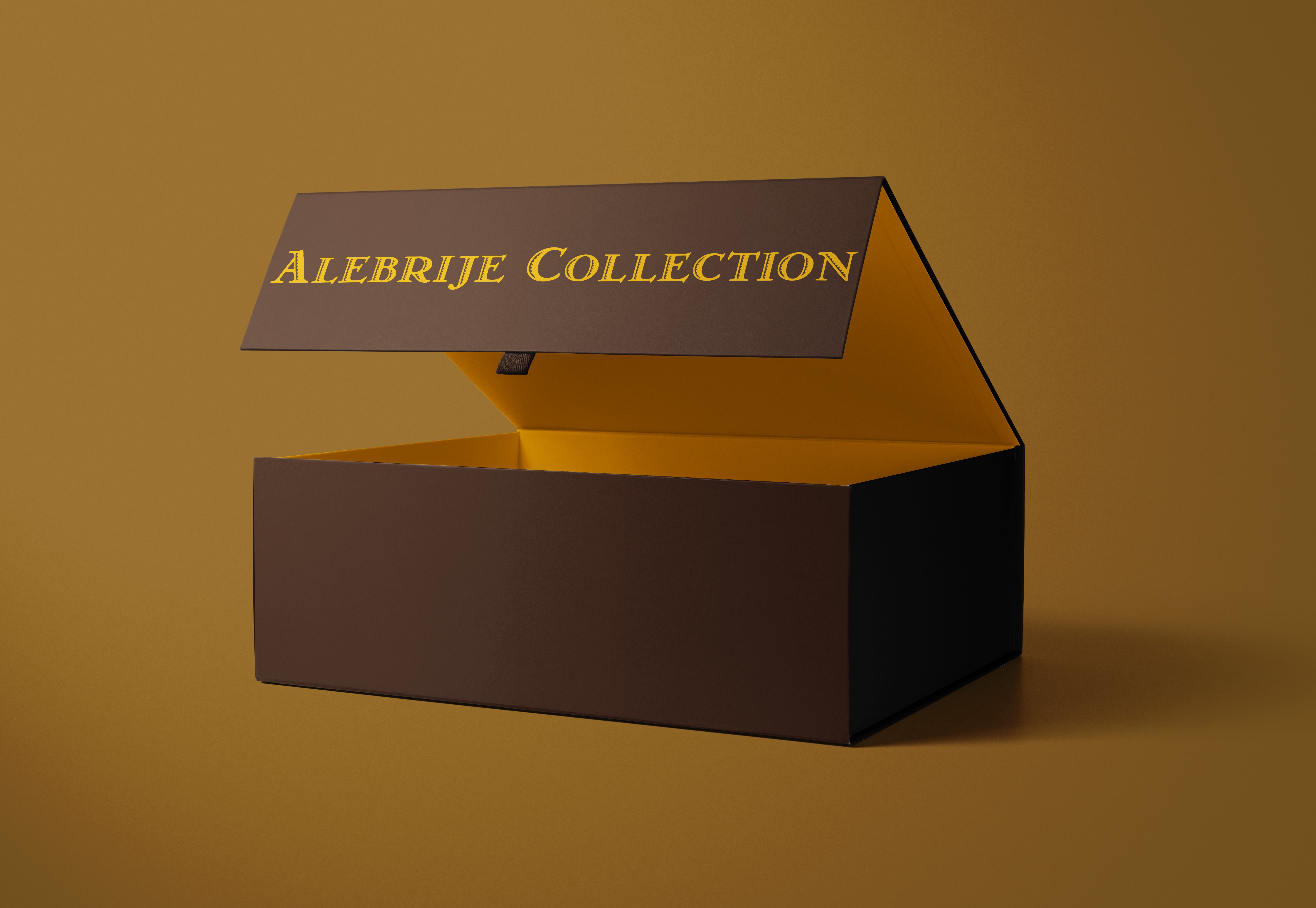 half opened box with alebrije collection printed on the side