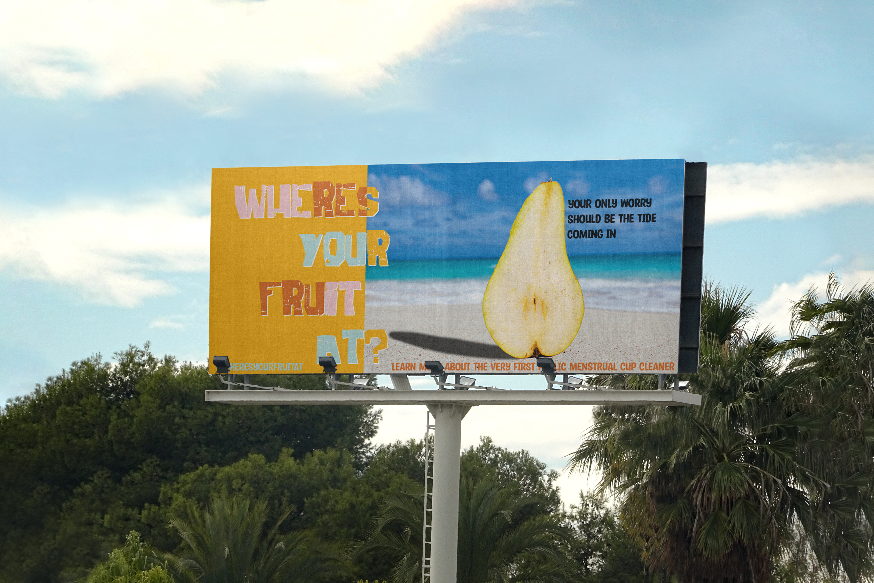 billboard for The Bettii Pod showing a pear on the beach 