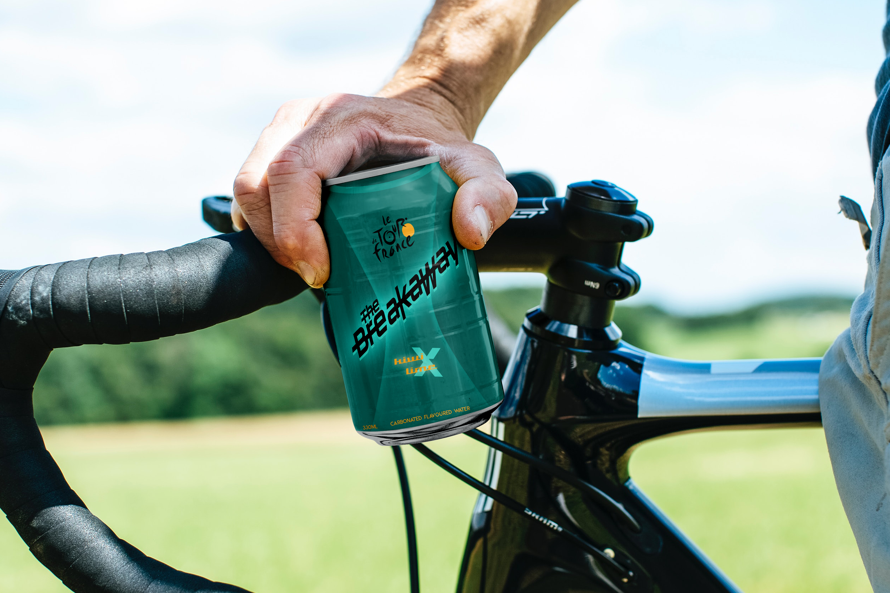 a turquoise can of The Breakaway carbonated water held over the handle bars of a bike 