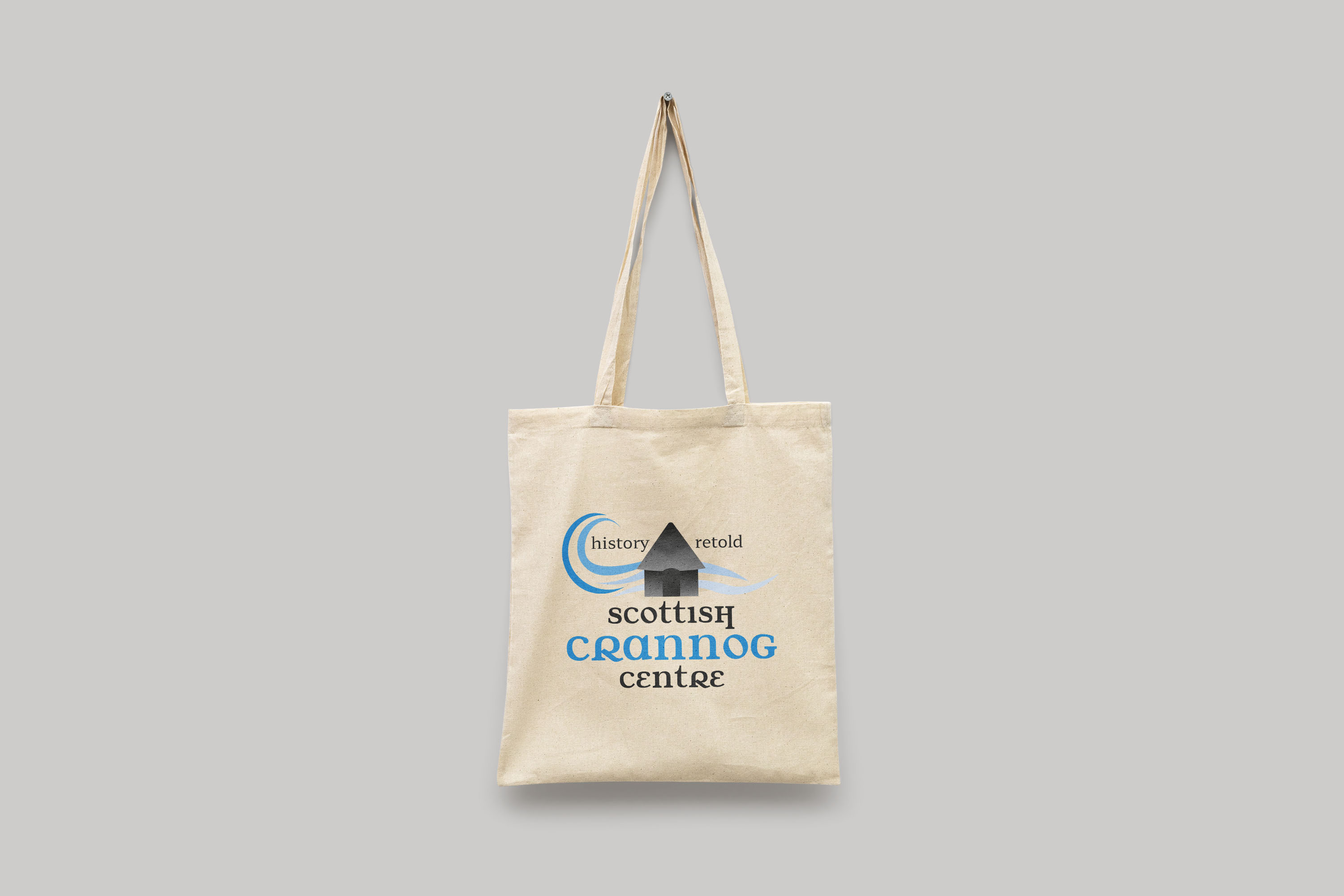 eco-friendly tote bag show crannog design in blue and white 