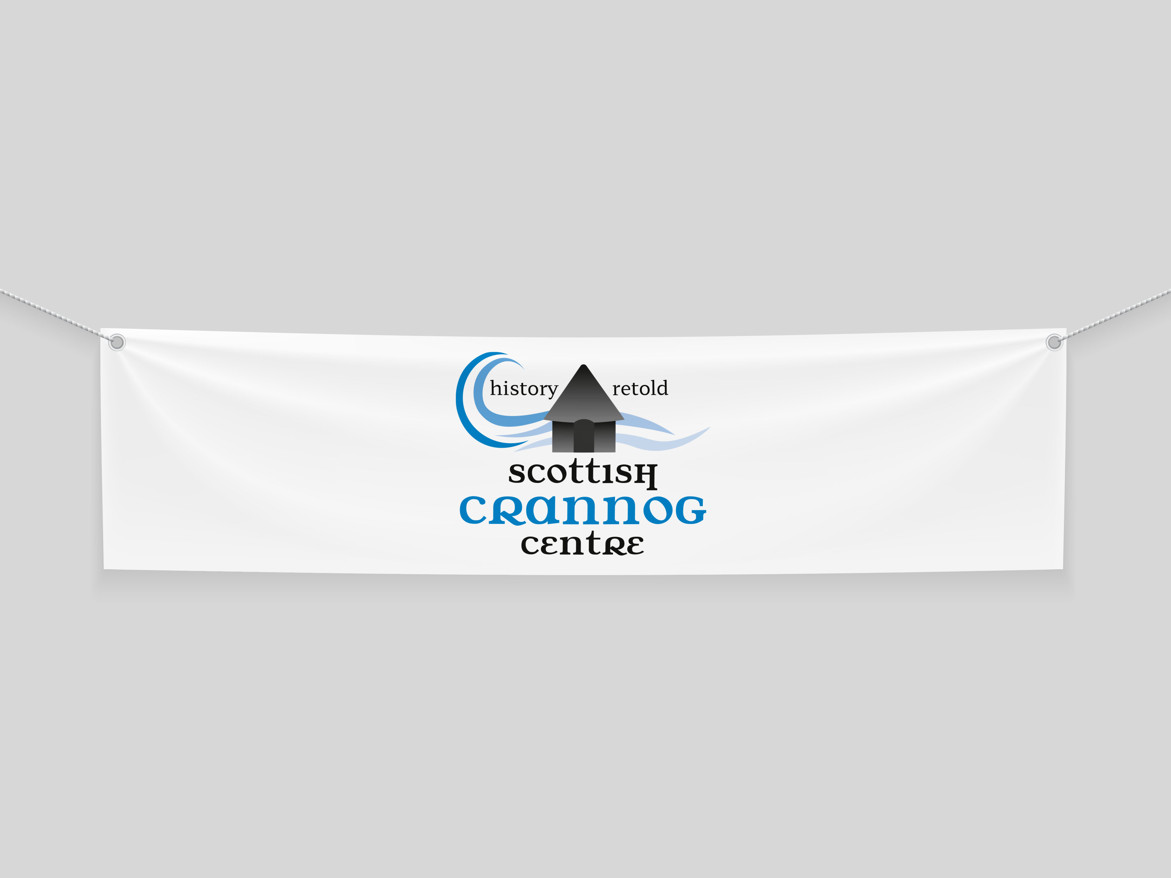 scottish crannog centre brand identity on a white banner 