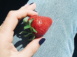Holding a Strawberry
