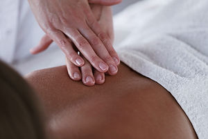 beautiful-blond-woman-receiving-massage.jpg