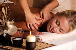 masseur-doing-massage-female-shoulder-beauty-salon.jpg
