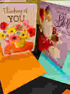 2 greeting cards. 1 says Thinking Of you, 1 says You Are A Blessing In Our Life.