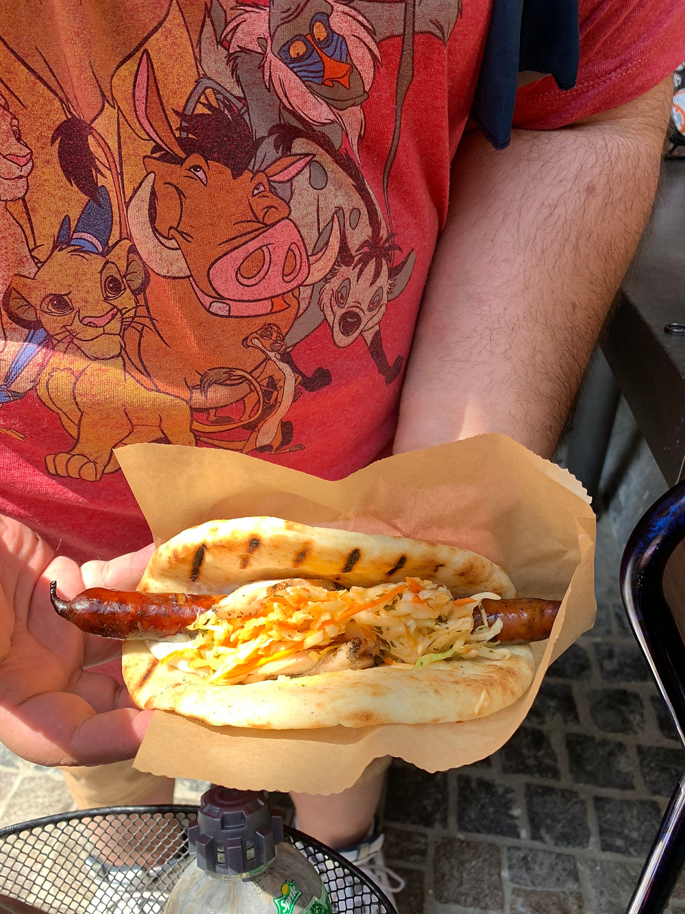 Disney Ronto Wrap which is a sausage, pulled pork, coleslaw in a PITA bread