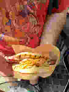 Disney Ronto Wrap which is a sausage, pulled pork, coleslaw in a PITA bread
