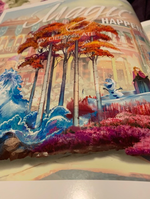 Photo of a magazine article about Magic Happens parade at Disneyland