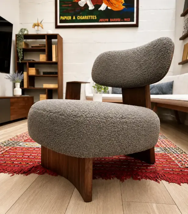 TEAM 7 Elliot lounge chair in walnut with premium upholstery
