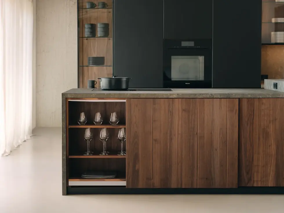 Custom TEAM 7 kitchen cabinetry detail with integrated storage and natural wood finishes
